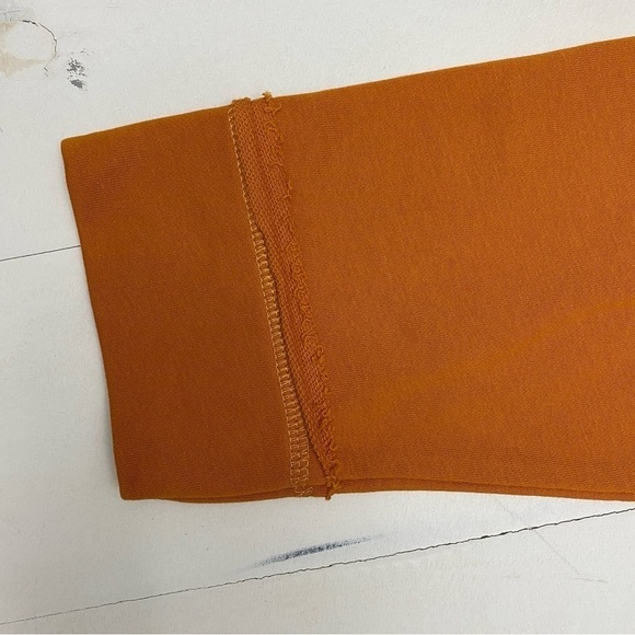 Umgee French Terry, animal print raw edge detail tunic with side slits medium - Picture 9 of 14